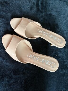 Calvin Klein Women’s Nude Patent Open-Toe Slide Mules